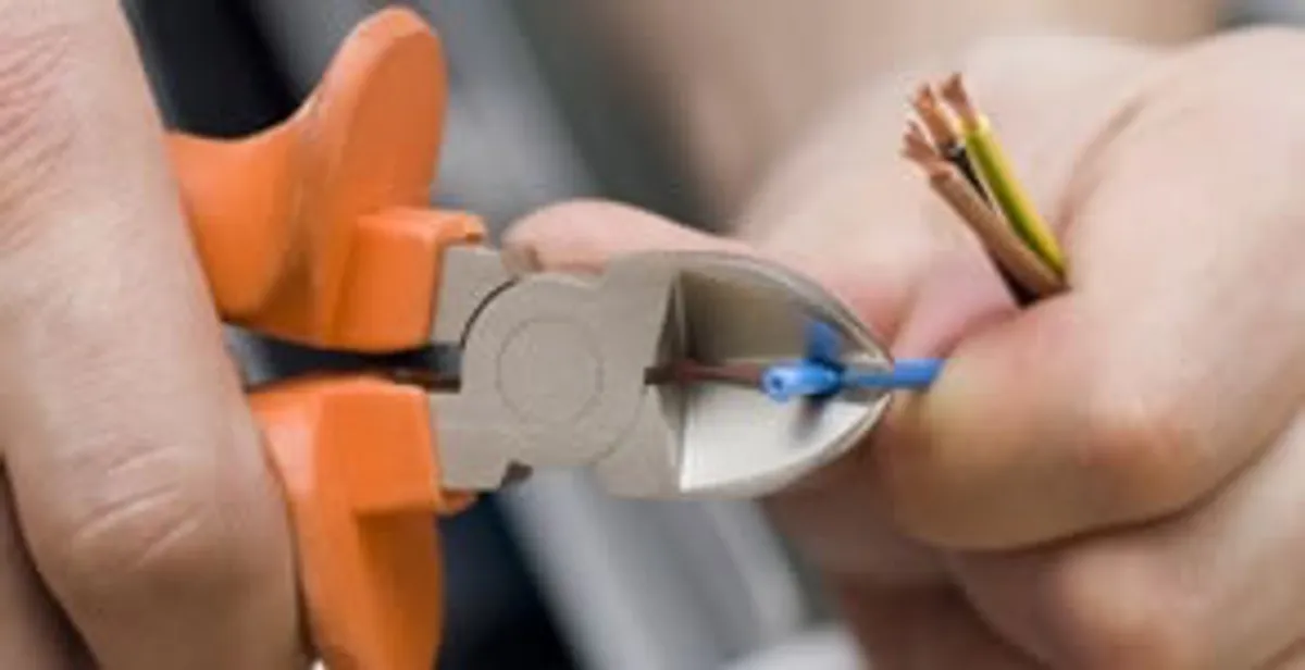 professional electrical services showing precise wire cutting by licensed electricians in Saint Petersburg, FL